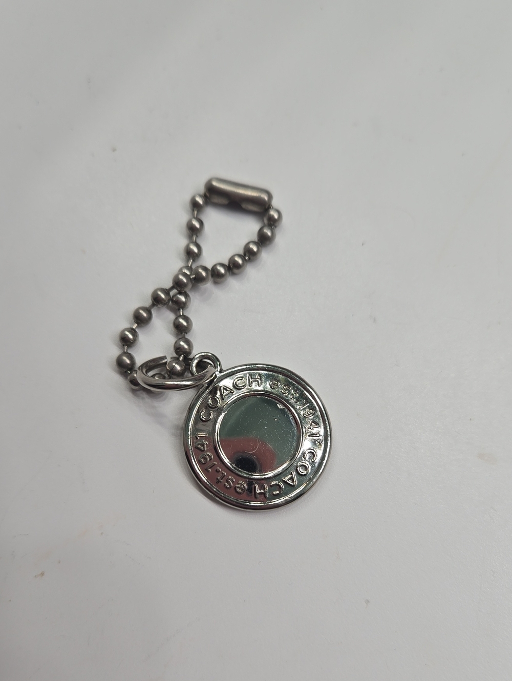 Coach Silver-Tone Round Logo Bagcharm